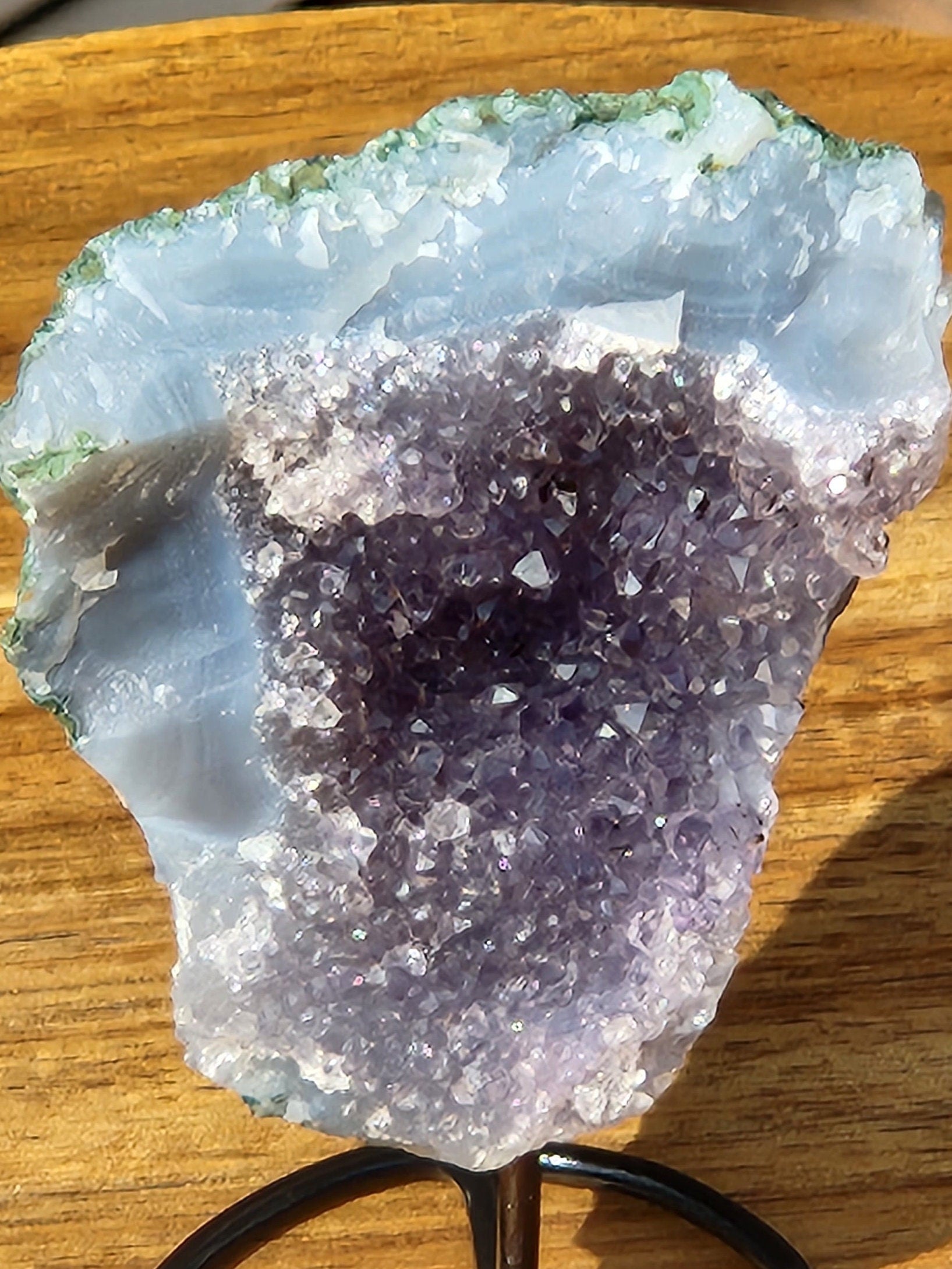 Cute Little Purple Amethyst Crystal Free Form on a black metal stand