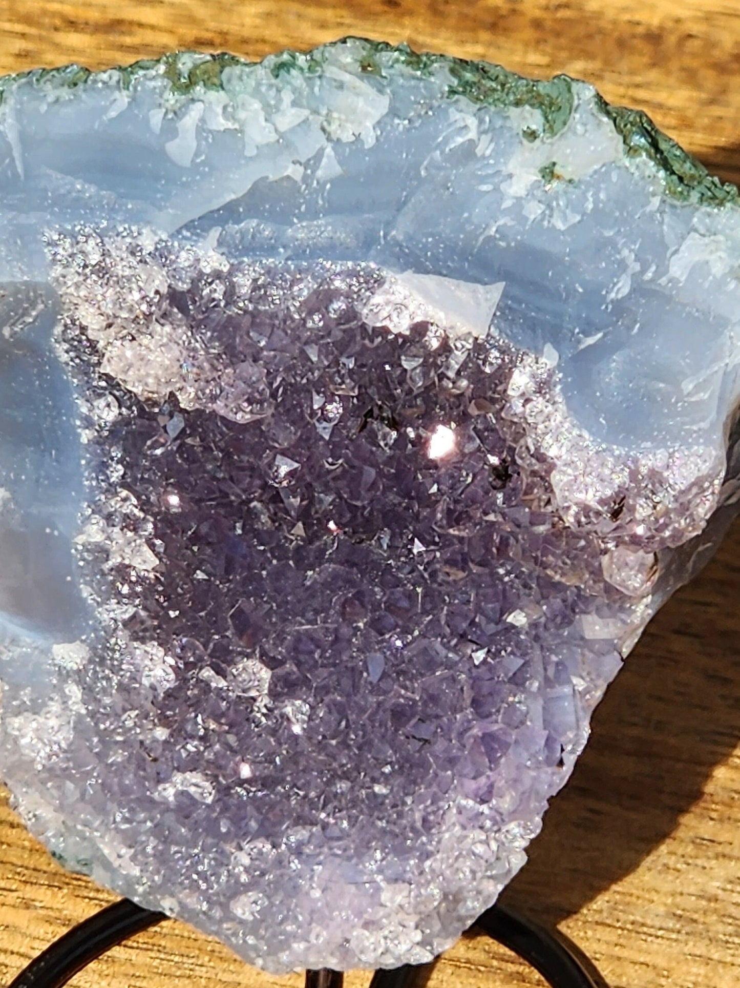 Cute Little Purple Amethyst Crystal Free Form on a black metal stand