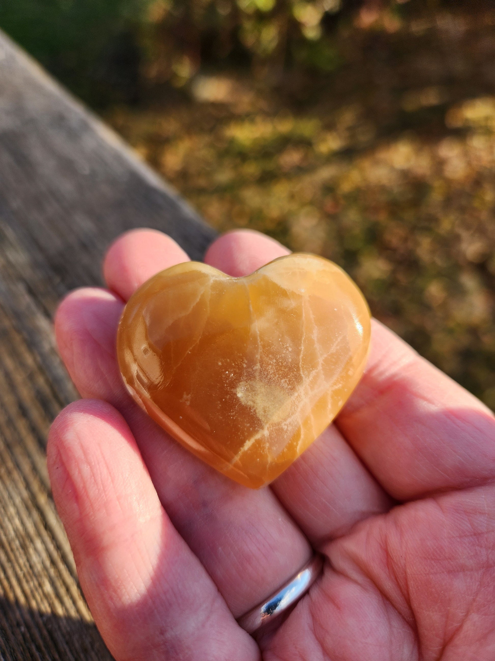AAA Honey Calcite Crystal Heart: Golden Hues, Polished Stone