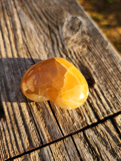 AAA Honey Calcite Crystal Heart: Golden Hues, Polished Stone