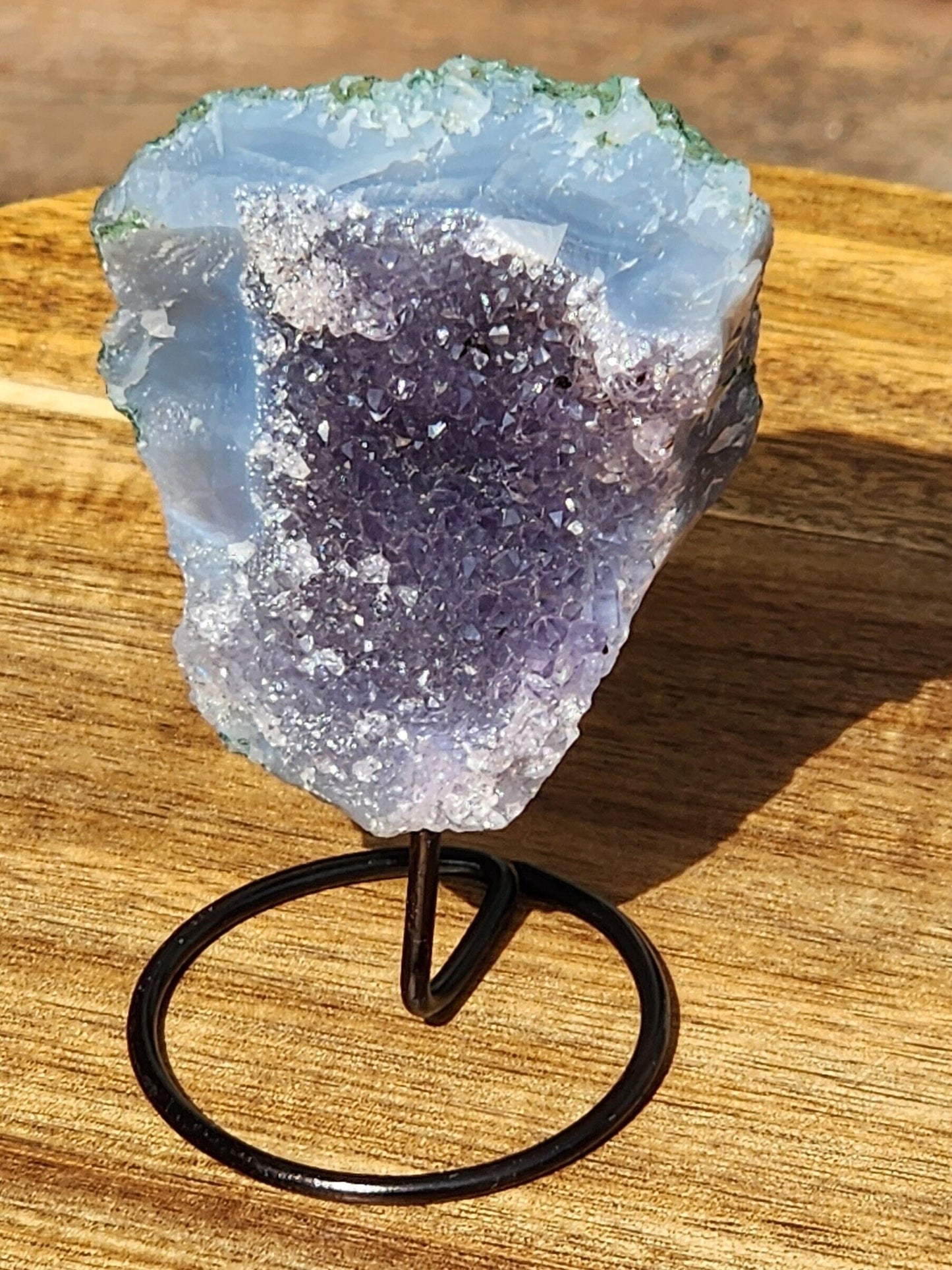 Cute Little Purple Amethyst Crystal Free Form on a black metal stand