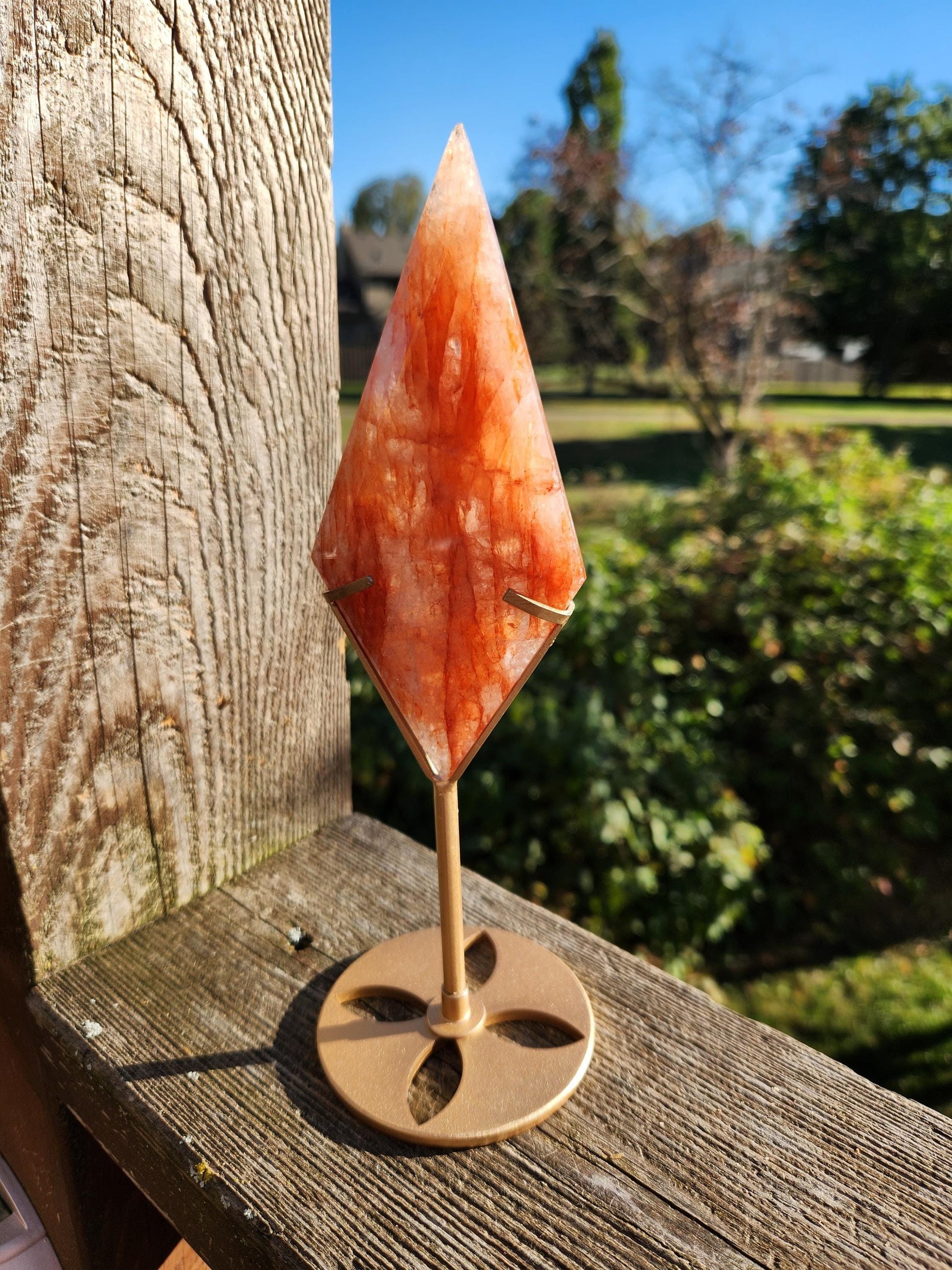 Unique Fire Quartz Crystal Faceted Diamond on Gold Stand