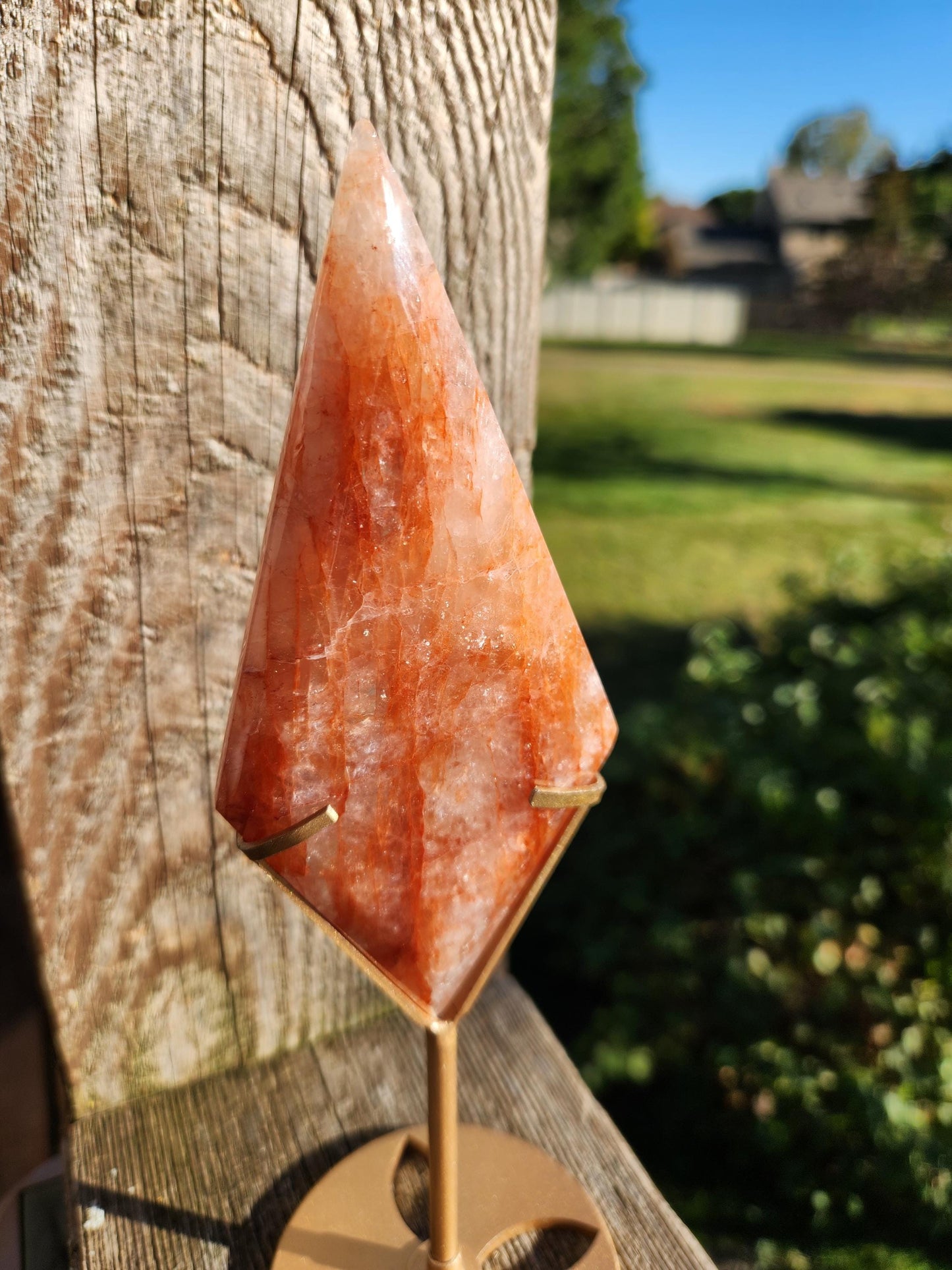 Unique Fire Quartz Crystal Faceted Diamond on Gold Stand