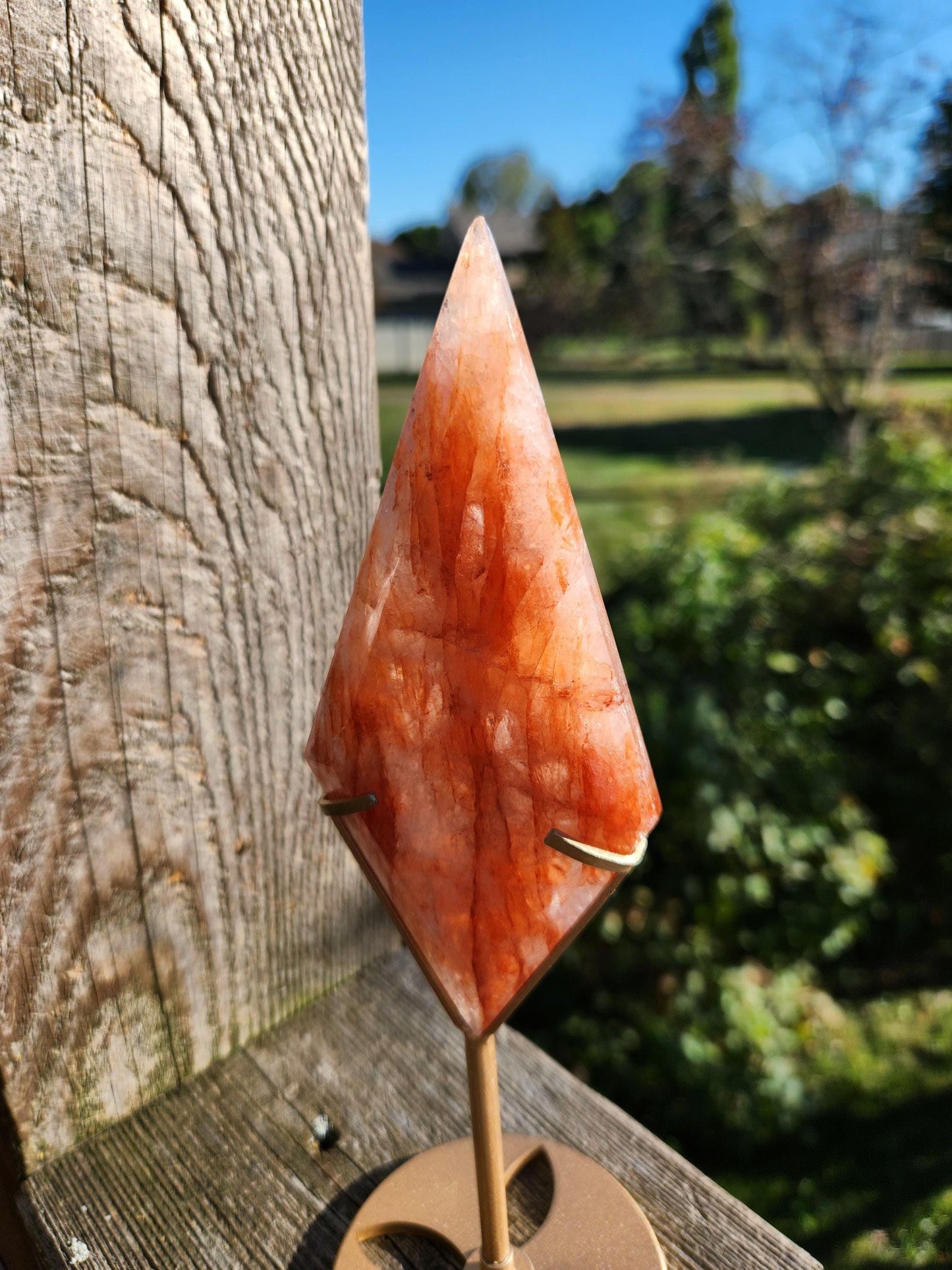 Unique Fire Quartz Crystal Faceted Diamond on Gold Stand