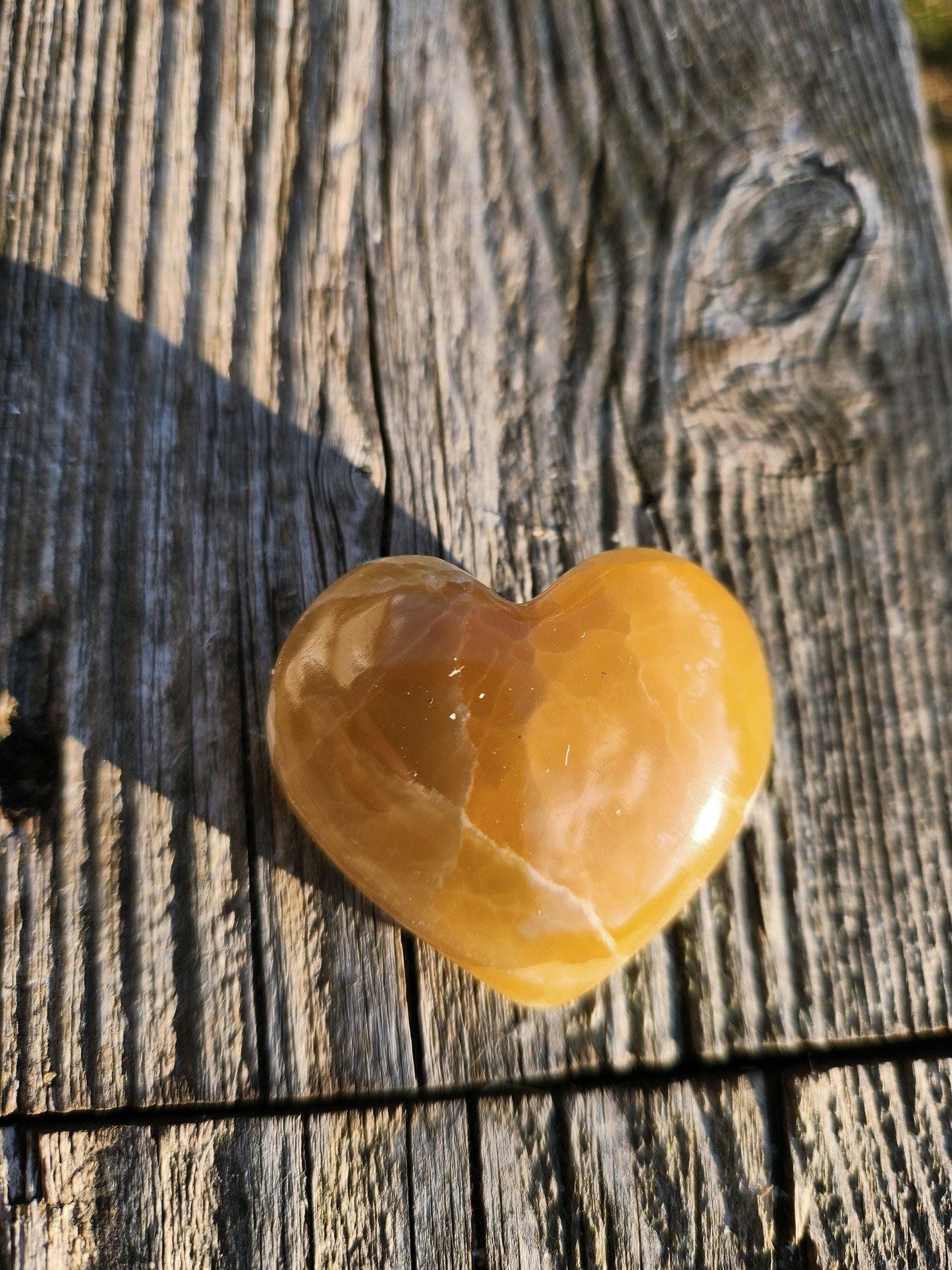 AAA Honey Calcite Crystal Heart: Golden Hues, Polished Stone
