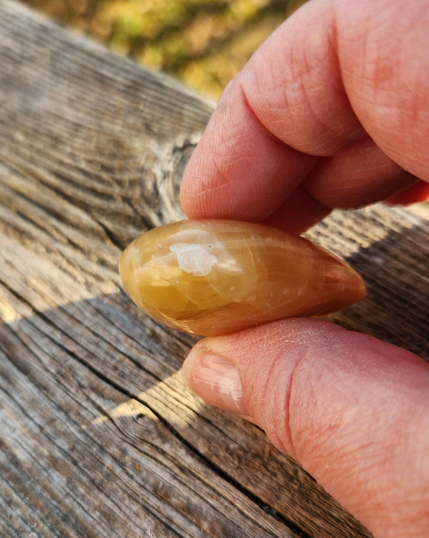 AAA Honey Calcite Crystal Heart: Golden Hues, Polished Stone