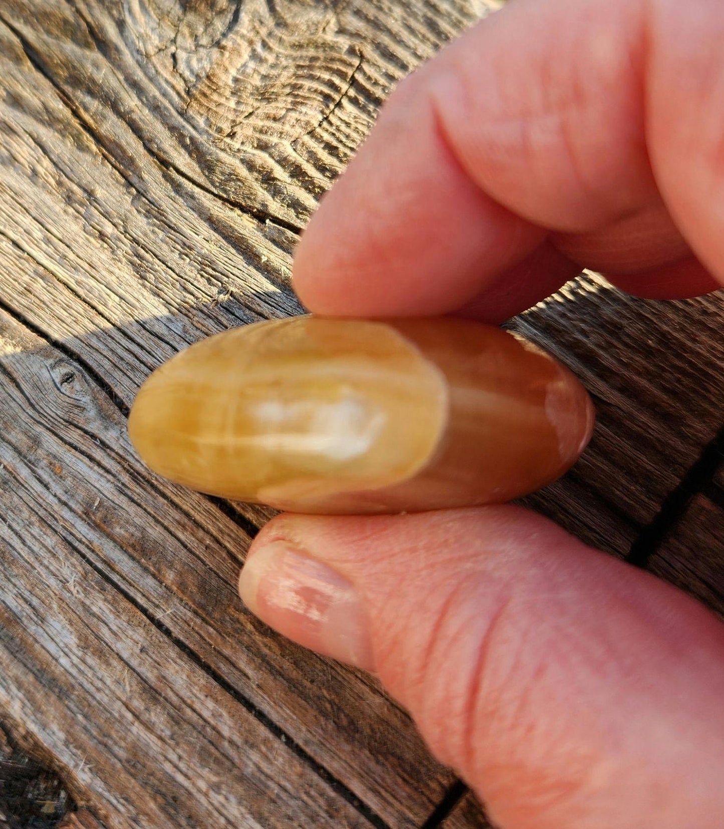 AAA Honey Calcite Crystal Heart: Golden Hues, Polished Stone