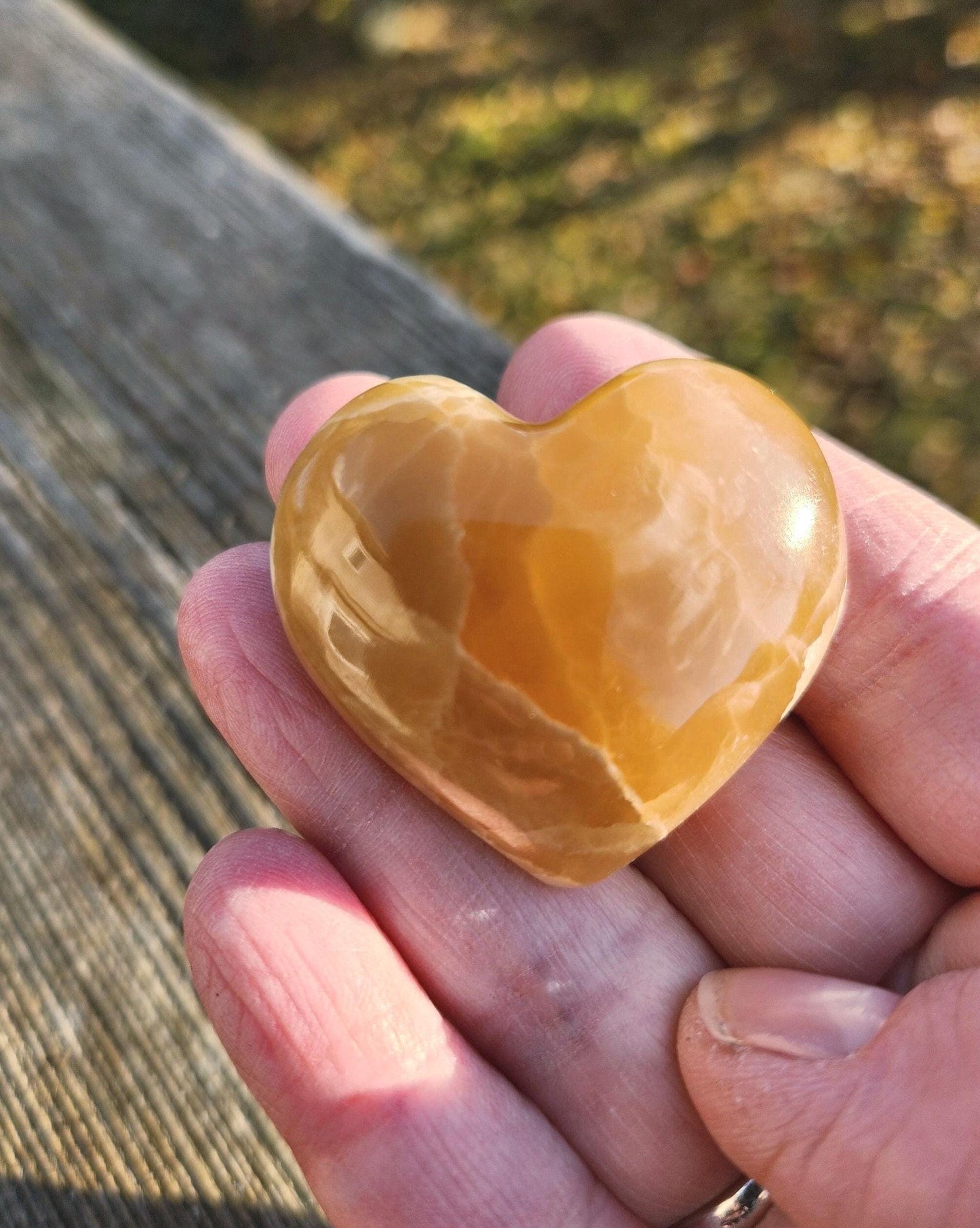 AAA Honey Calcite Crystal Heart: Golden Hues, Polished Stone