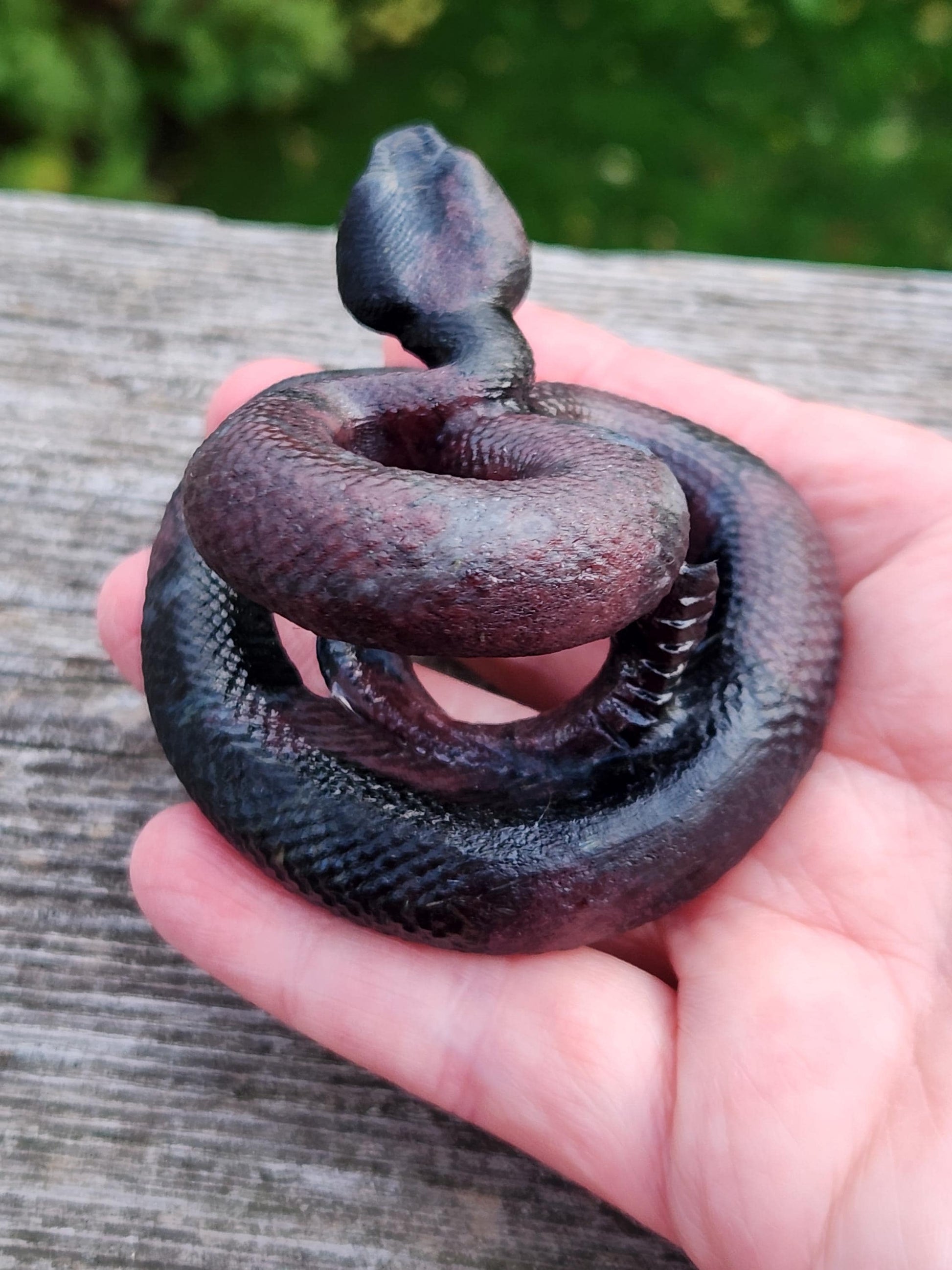 Carved Garnet Fireworks Snake Crystal Carving, Rattlesnake