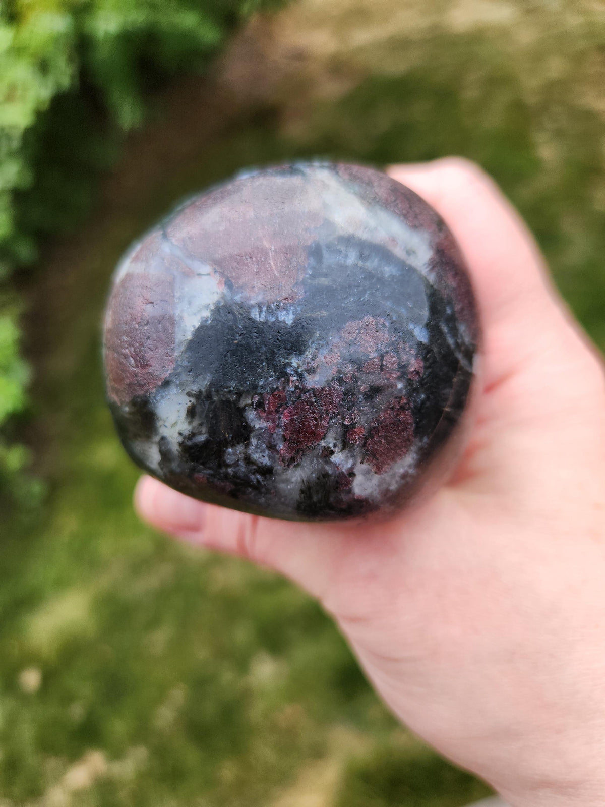 Double Skull in Garnet with Fireworks or Arfvedsonite Crystal Carving