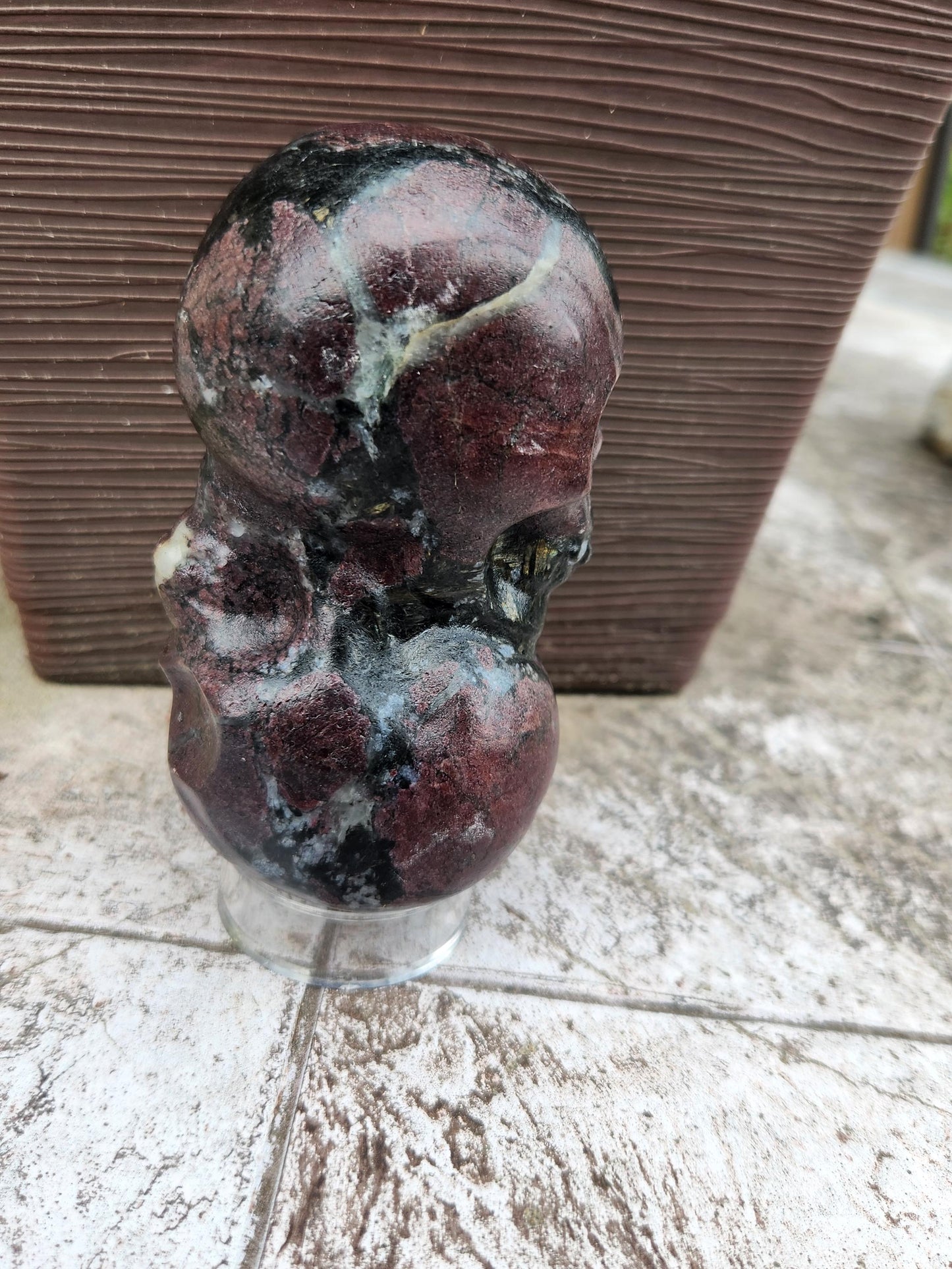 Double Skull in Garnet with Fireworks or Arfvedsonite Crystal Carving