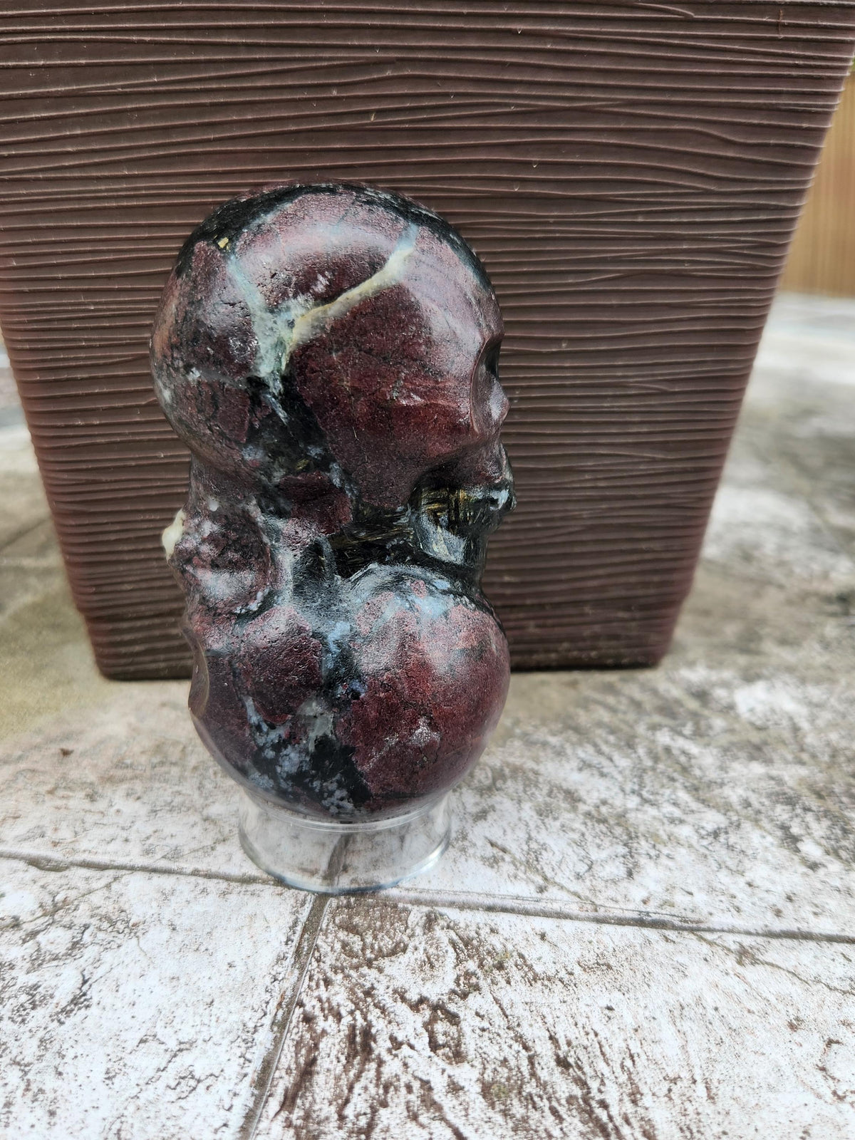 Double Skull in Garnet with Fireworks or Arfvedsonite Crystal Carving