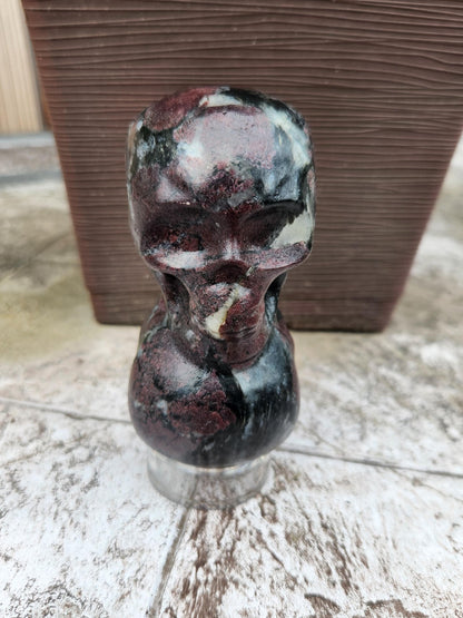 Double Skull in Garnet with Fireworks or Arfvedsonite Crystal Carving
