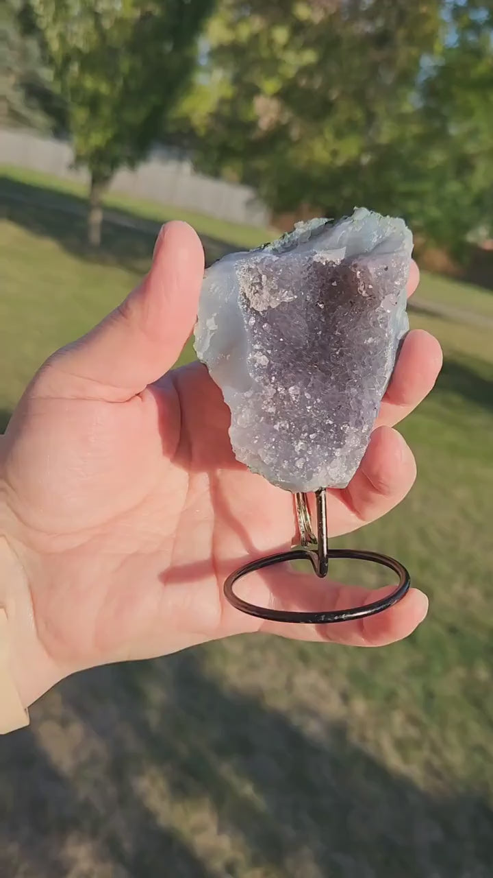 Cute Little Purple Amethyst Crystal Free Form on a black metal stand